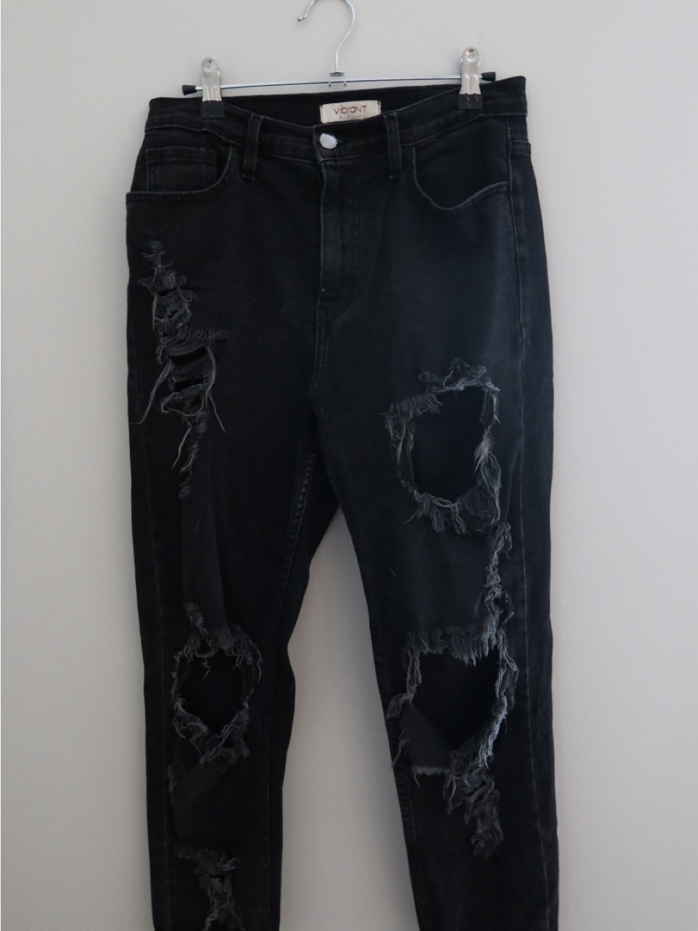 Vibrant Black Distressed Skinny Jeans